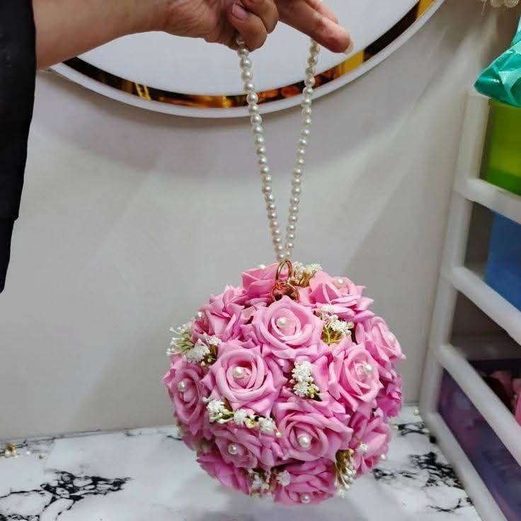 Handmade artificial flower bag with pink roses and pearl chain handle for bridal wear